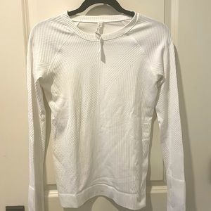 Lululemon white long sleeve tshirt. Size 8
